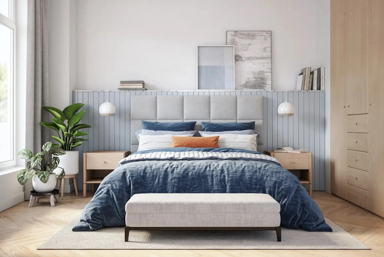 A freshly made, guest-ready bedroom with natural light